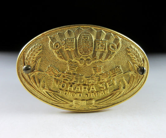 Manufacturer's Badge from Metal Safe