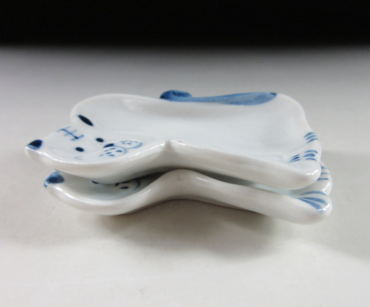 Pair of Tiger Sauce Plates