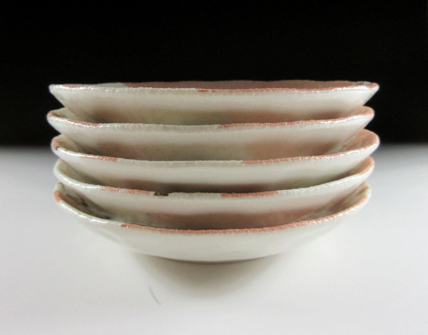 Set of Five Small Shino Glaze Plates