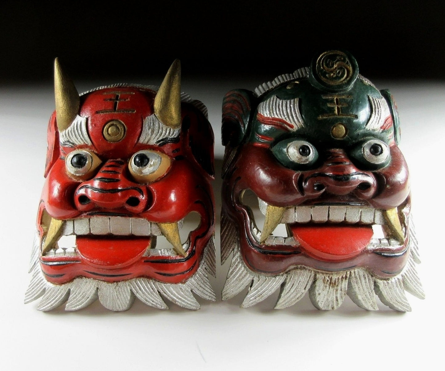 Pair of Wooden Mask Ornaments