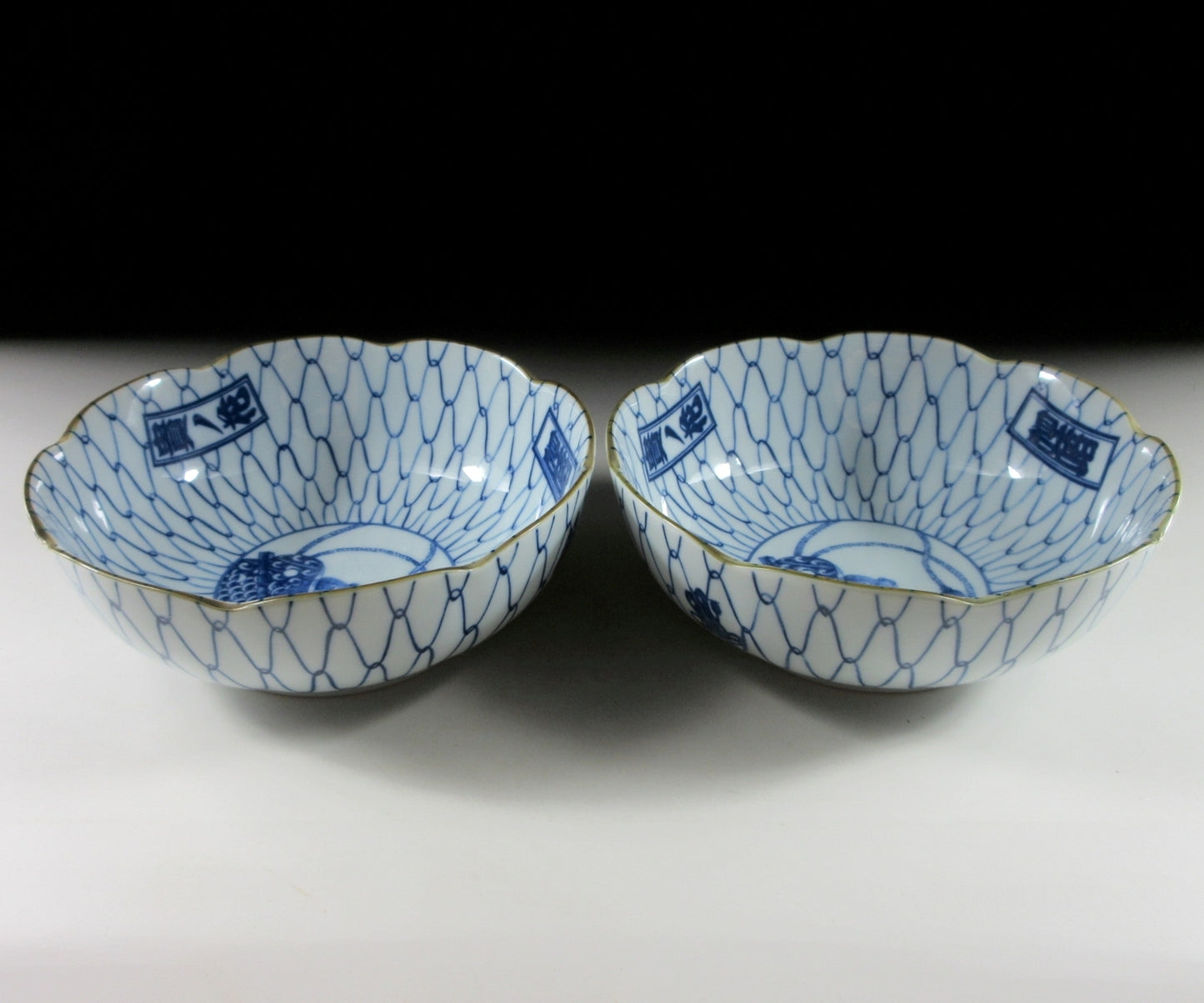 Pair of Sumo-Themed Bowls with Ami Pattern #1