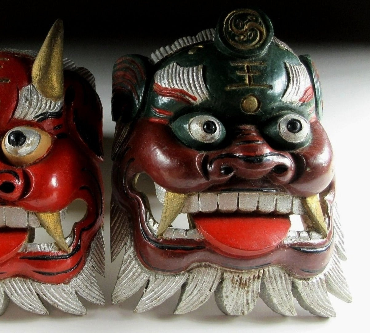 Pair of Wooden Mask Ornaments