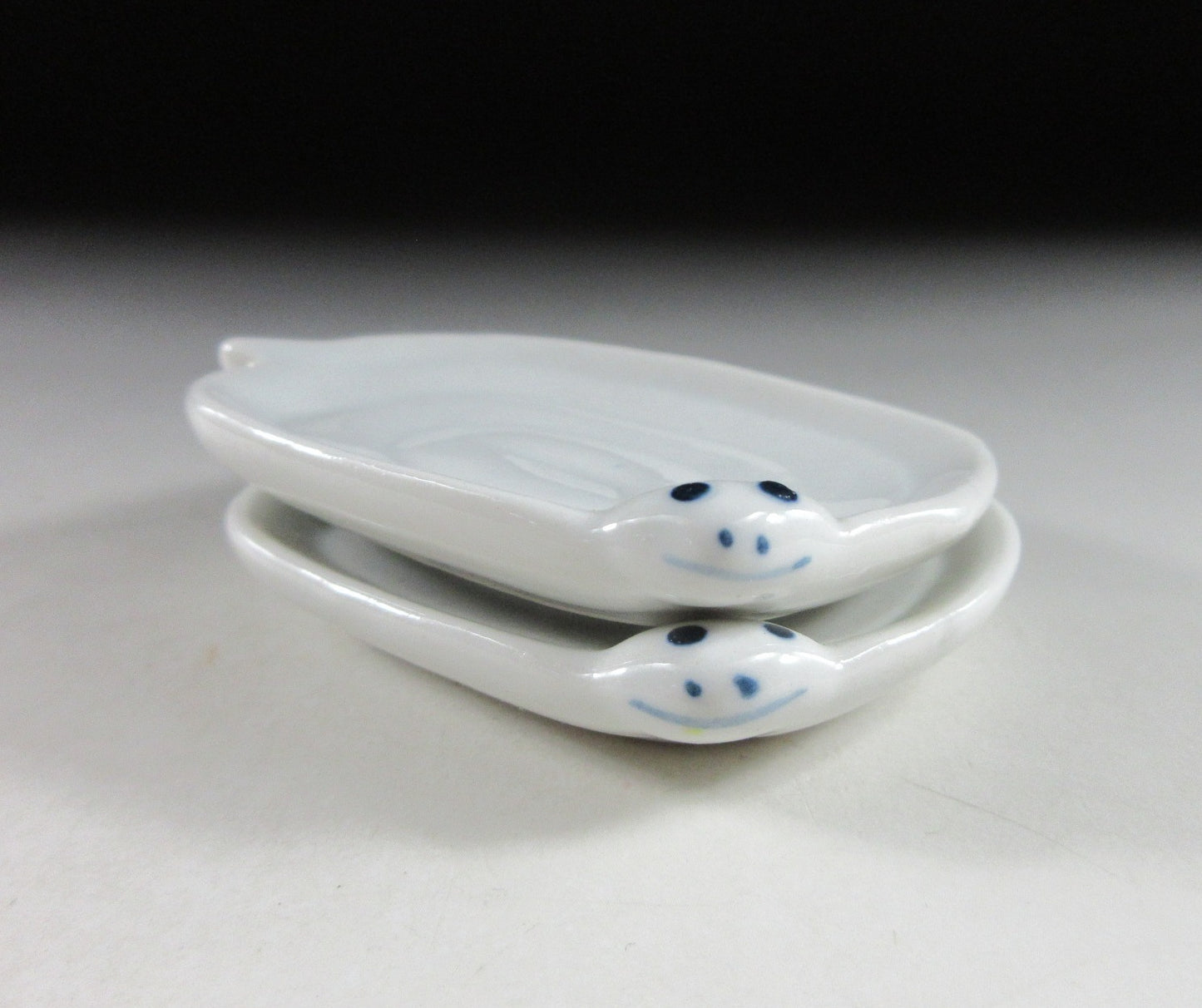 Pair of Year of the Snake Condiment Plates