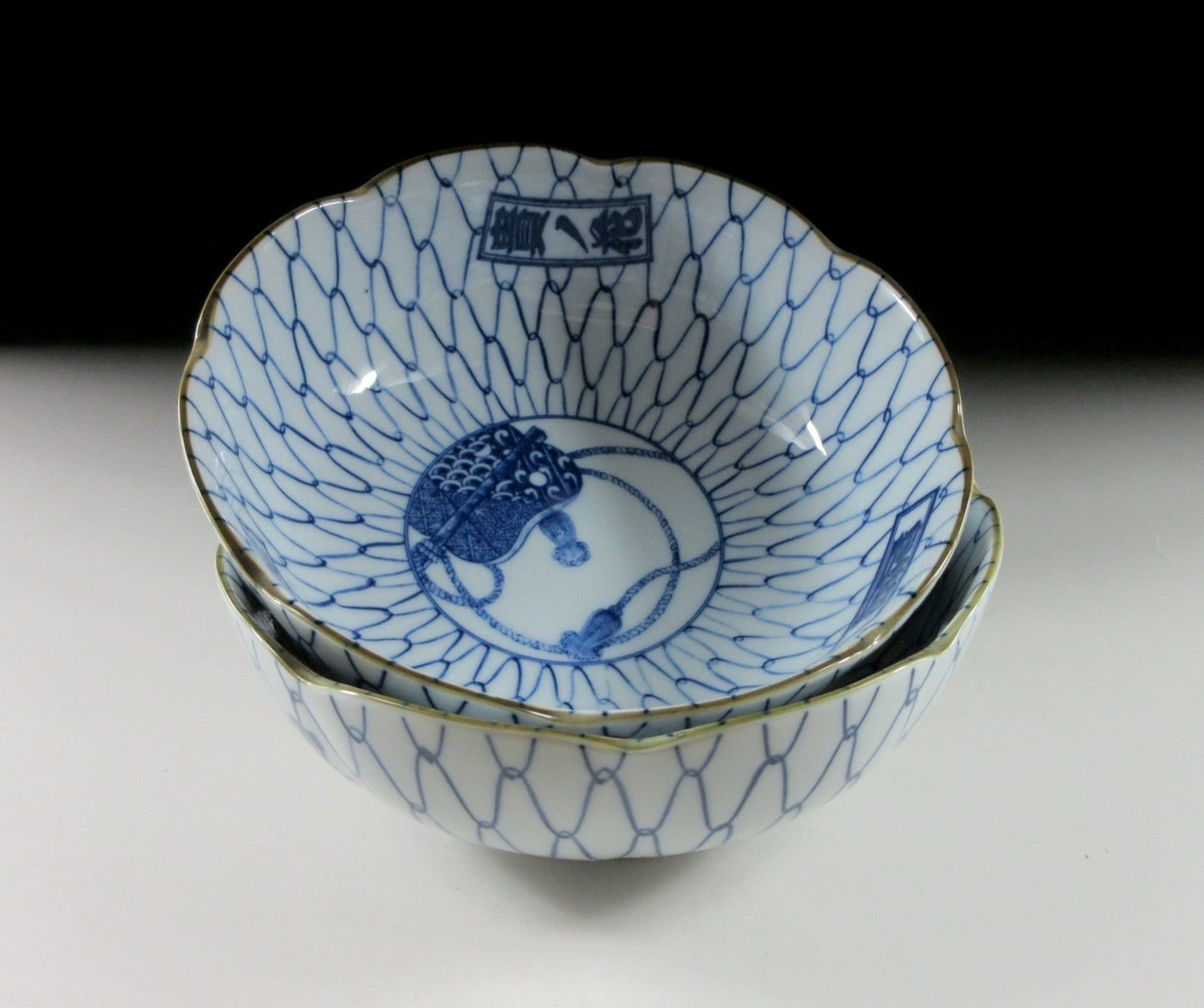 Pair of Sumo-Themed Bowls with Ami Pattern #1