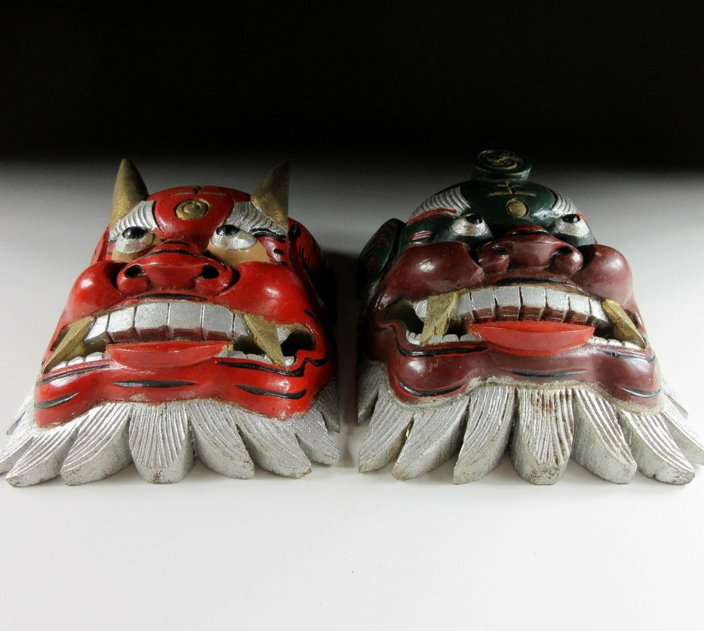 Pair of Wooden Mask Ornaments